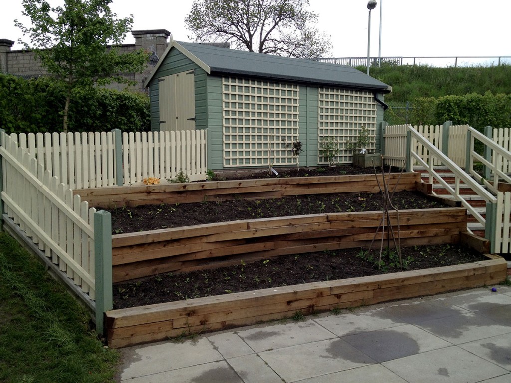 school-sloped-staging-and-garden-norfolk