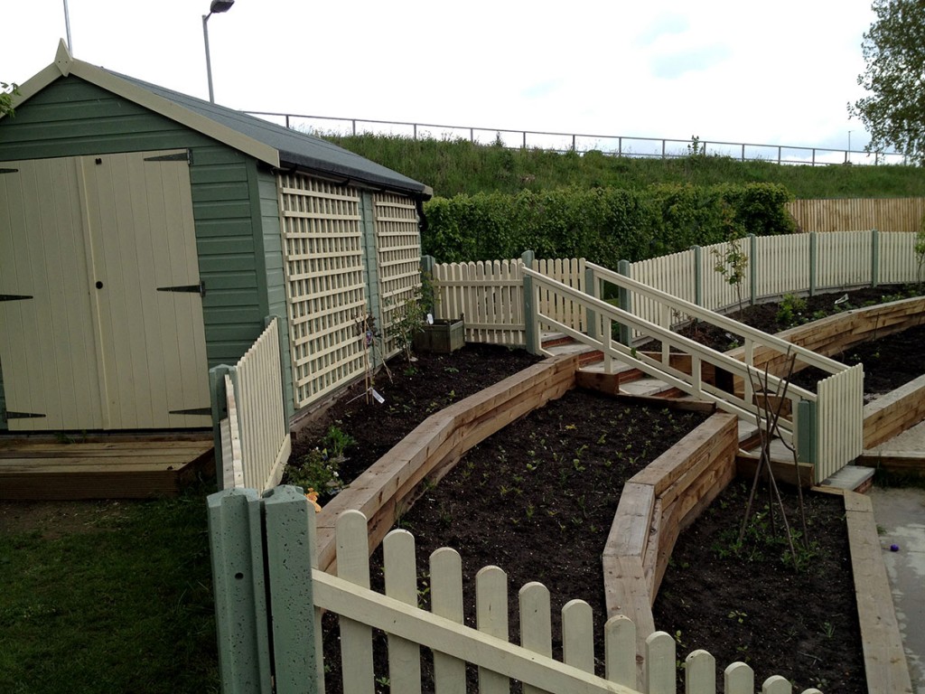 school-sloped-staging-and-garden-norwich